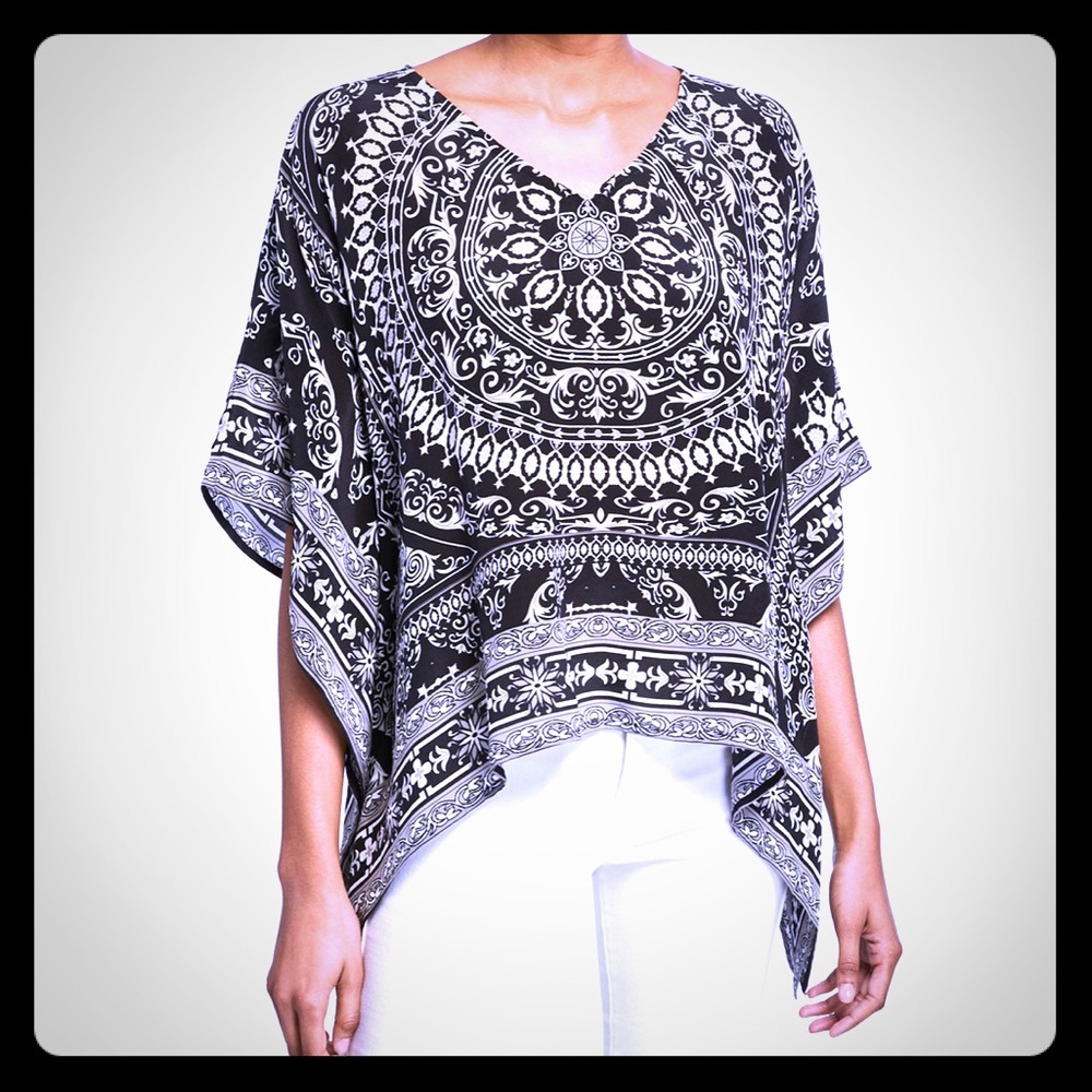 Asymmetrical silk tunic small but more like size 8